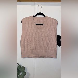 Pink sweater vest